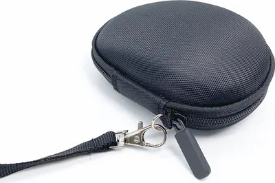 A black hard travel case for a wireless mouse, shown on a white background with a black strap and metal clasp.