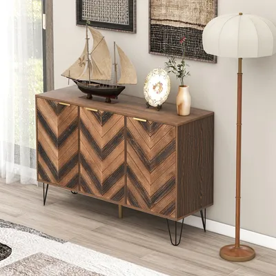 A wooden sideboard with a chevron pattern is displayed in a room with a floor lamp and artwork on the wall.