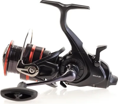 A black and red fishing reel is shown against a white background.