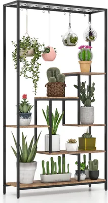 A multi-tiered plant stand filled with various potted plants.