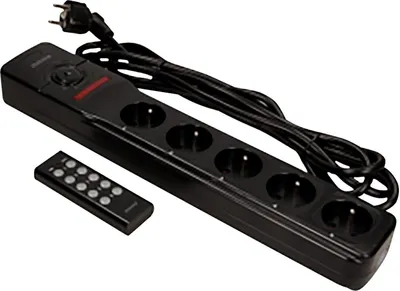 A black power strip with multiple outlets and a remote control.