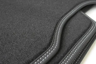 Immagine prodotto di Tappetini PREMIUM adatti a M5 BMW Serie 5 E60 E61 4 pezzi, neri con doppie cuciture argento