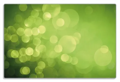 Produktbild von Wallario Frühstücksbrettchen aus Glas 20 x 30 cm mit rutschfesten Füßen, Motiv Abstrakte grüne Kreise  grüne Lichtpunkte