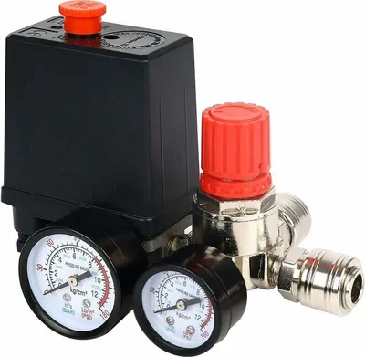 A close-up view of an air compressor pressure switch and regulator.