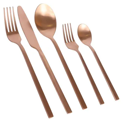 A set of copper-colored cutlery arranged diagonally on a white background.