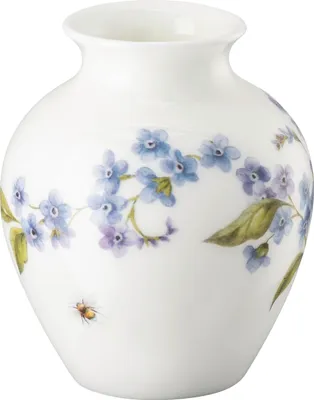 A white vase decorated with blue forget-me-nots and a small bee.