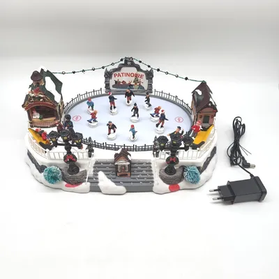 Produktbild von FEERIC LIGHTS CHRISTMAS Village de noël patinoire animéMusical 24 LED transfo