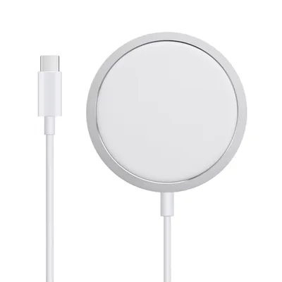 A white wireless charger with a silver rim and a white USB-C cable is shown against a white background.