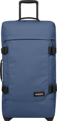 A blue Eastpak rolling suitcase is shown against a white background.