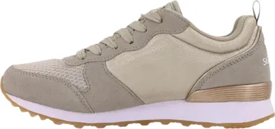 Side view of a tan and gold Skechers sneaker.