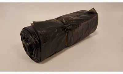 Produktbild von Packung mit 10 Rollen x 60 Hygienebeutel schwarz für OdoCare 45