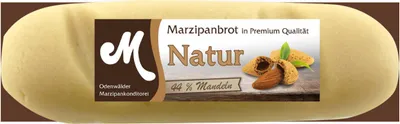 A marzipan loaf with a label showing almonds and text.