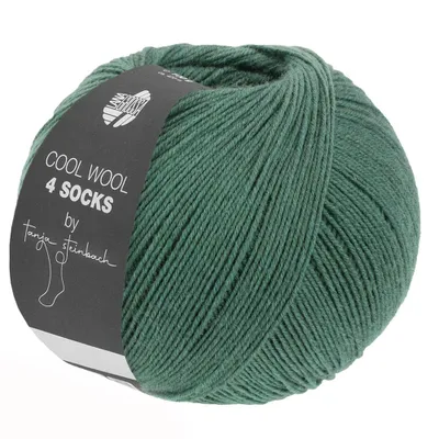 A ball of green yarn with a dark label.