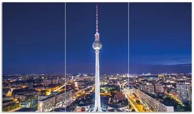 Produktbild von Wallario Herdabdeckplatte aus Glas, Größe 90 x 52 cm 3-teilig, Motiv Fernsehturm Berlin bei Nacht