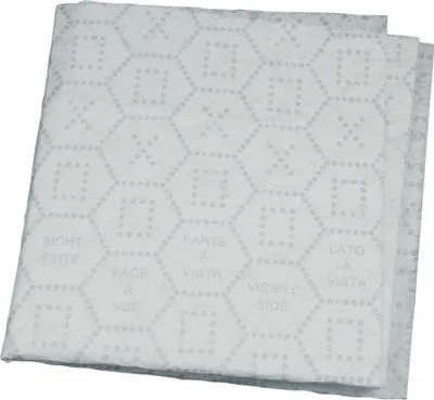 A stack of white, folded grease filter mats with a hexagonal pattern.