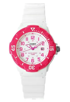 A white Casio watch with a pink bezel and pink accents on the face, shown against a white background.
