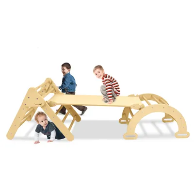 Children playing on a wooden climbing structure.