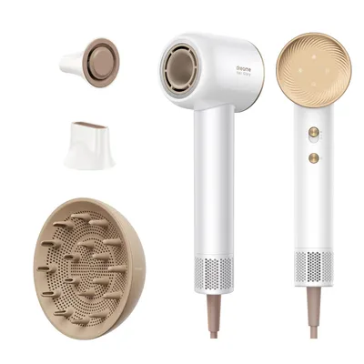 A product shot of a hairdryer and its attachments against a white background.