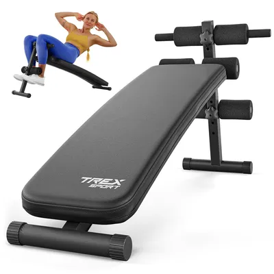 A sit-up bench with a woman using it in the background.