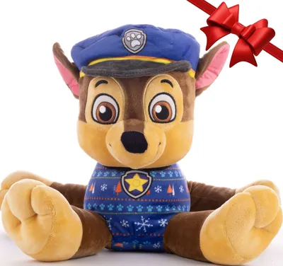 A plush toy of Chase from Paw Patrol wearing a festive sweater and hat, with a red ribbon overlay.