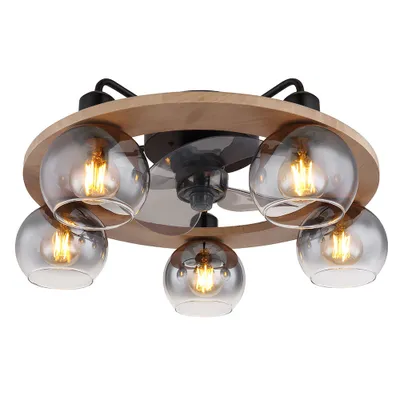 A close-up, eye-level shot of a ceiling fan with lights.