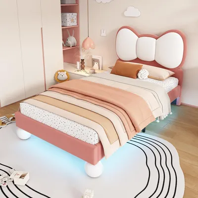 Produktbild von Merax Polsterbett 90x200 aus Samtstoff, Kinderbett mit Fliege-Kopfteil, Einzelbett mit LED-Lichtleiste, stabiler Lattenrost, beige + rosa