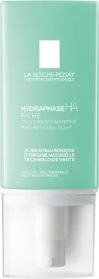 A product shot of a skincare cream bottle with text and branding.