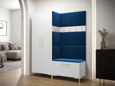 A modern entryway with a white wardrobe and a blue upholstered bench with coat hooks.