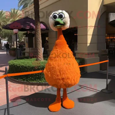 Productafbeelding van Oranje struisvogel mascotte REDBROKOLY kostuum karakter gekleed met een wikkeljurk en dasspelden