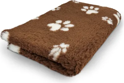 A folded brown blanket with white paw prints on a white background.