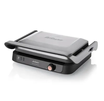 A close-up studio shot of a modern electric grill.