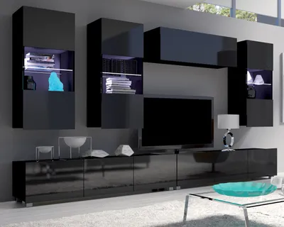 A modern living room wall unit with a TV and various cabinets and shelves.