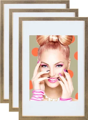 A woman with a creative hairstyle and makeup is shown in a picture frame, with other frames behind it.