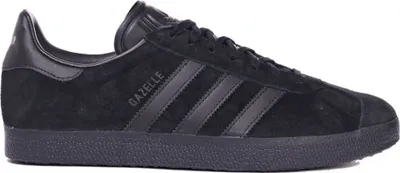 A single black Adidas Gazelle sneaker is shown from the side against a white background.