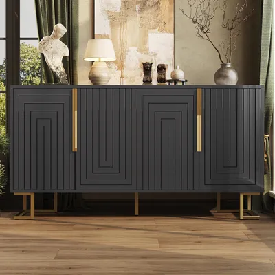 A dark gray sideboard with geometric patterns, gold handles, and gold legs, placed in a room with a painting, a lamp, and curtains.
