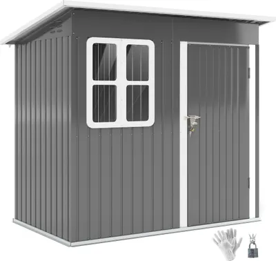 A dark gray metal garden shed with a white roof, a window, and a door with a lock and key. A pair of white gloves and a padlock are in the foreground.