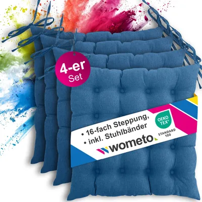 A set of blue seat cushions with a colorful powder explosion in the background.