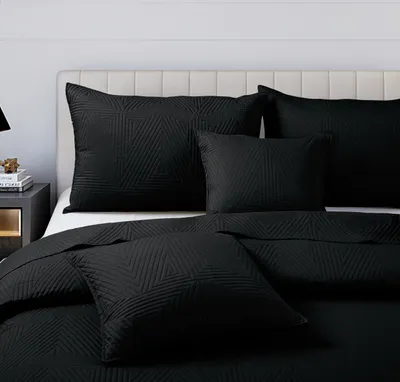 Produktbild von Schwarze Tagesdecke Sofa Steppdecke PLED 75x150 TRIO
