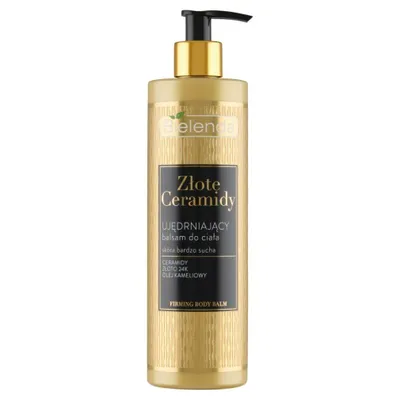A gold-colored bottle of body lotion with a black pump dispenser.