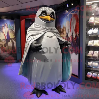 Produktbild von Silbernes REDBROKOLY Pinguin-Maskottchenkostüm mit Überwurf und Broschen