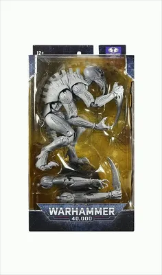 A Warhammer 40,000 action figure in its packaging.