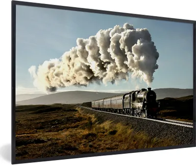 Produktbild von MuchoWow® Gerahmtes Poster Ein Dampfzug über eine Brücke mit der grünen Landschaft 30x20 cm - Poster mit Schwarzem Bilderrahmen Wandposter Rahmen Foto Bilder - Kunstdruck - Bild-Poster
