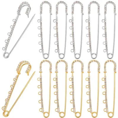 Image de Épingles de sécurité pour broches - Avec 5 œillets pour la fabrication de bijoux - 75 mm - 16 pièces - Finition argentée et dorée