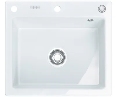 A top-down view of a white ceramic kitchen sink.