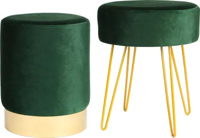 Two green velvet ottomans with gold accents, one with hairpin legs, on a white background.