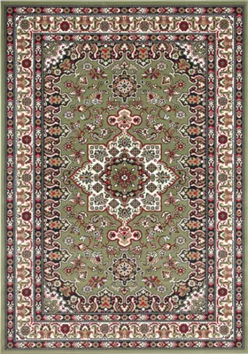 A top-down view of a Persian-style rug with a green background and intricate floral patterns in red, black, white, and brown.