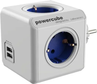 A white cube-shaped power strip with multiple outlets and USB ports, shown against a white background.