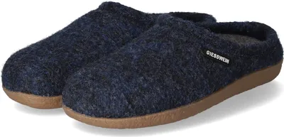 A pair of navy blue wool slippers with brown soles.