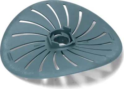 A teal-colored kitchen utensil accessory with a triangular shape and cutouts, placed on a white background.