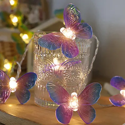 LED-Vlinderkette 3 m, 20 warmweiße LEDs, lila, batteriebetrieben
